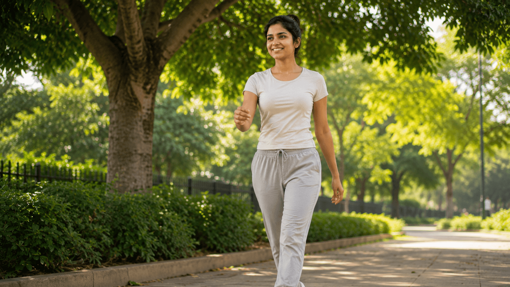 Natural Lifestyle Tips for Better Bowel Movement fitness girl brisk walking in green park under a tree for healthy bowel movement